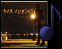 Picture of Bad Apples' album Left Standing; Girl standing alone on streets of Baltimore